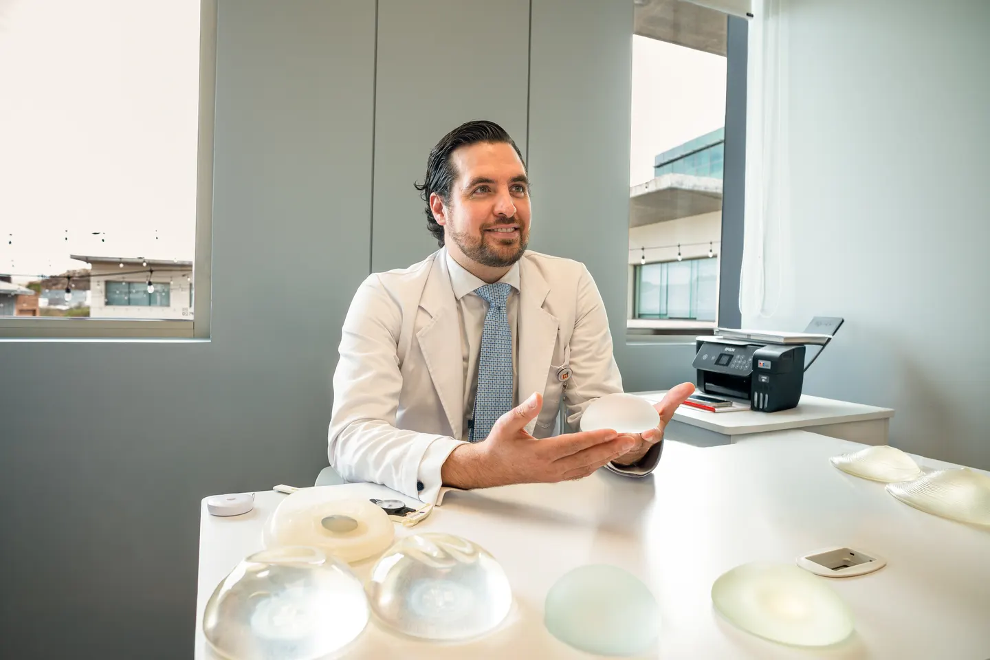 Dr. Guibaldo consulting with a facelift patient